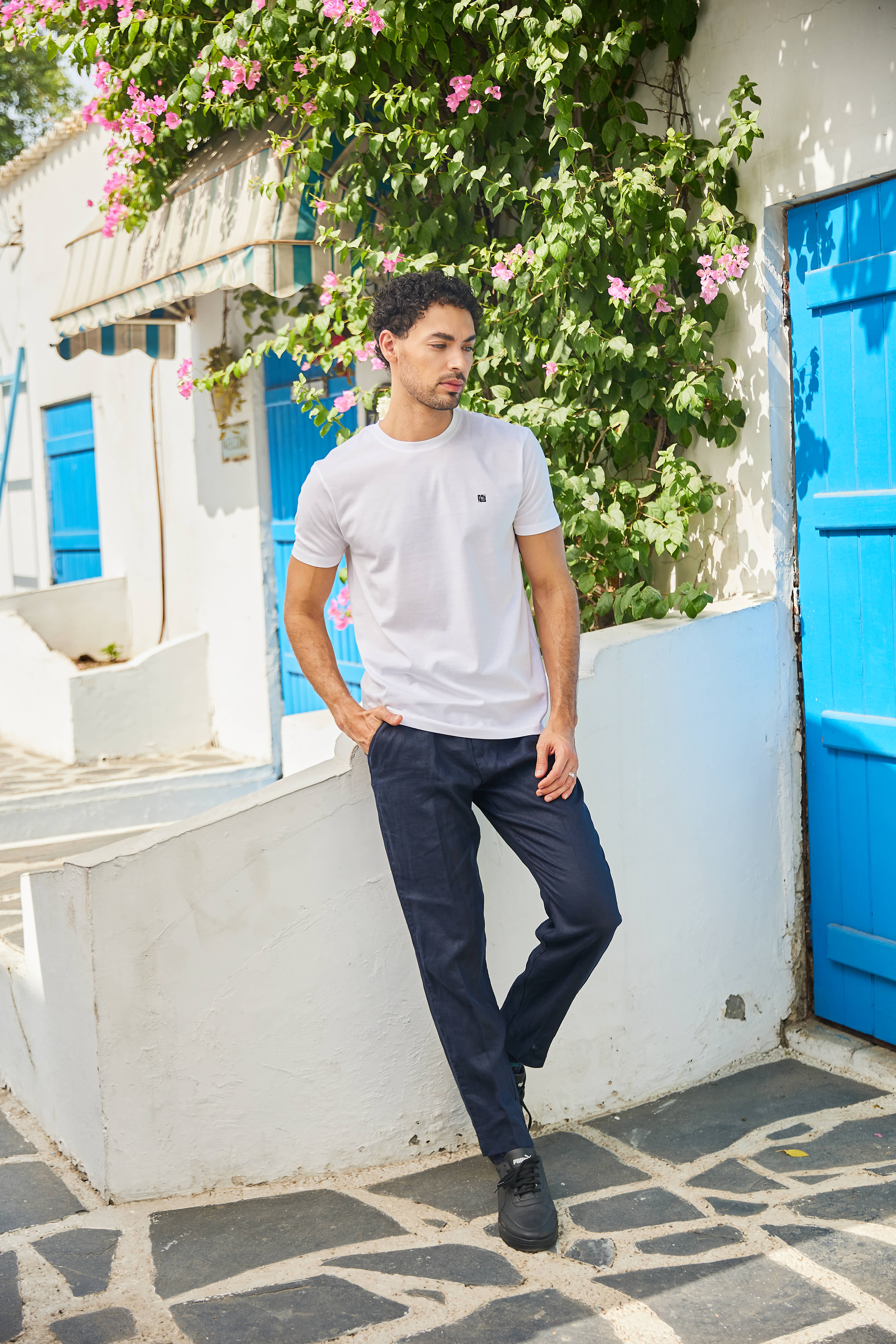 White Textured Solid Crew Neck T Shirt