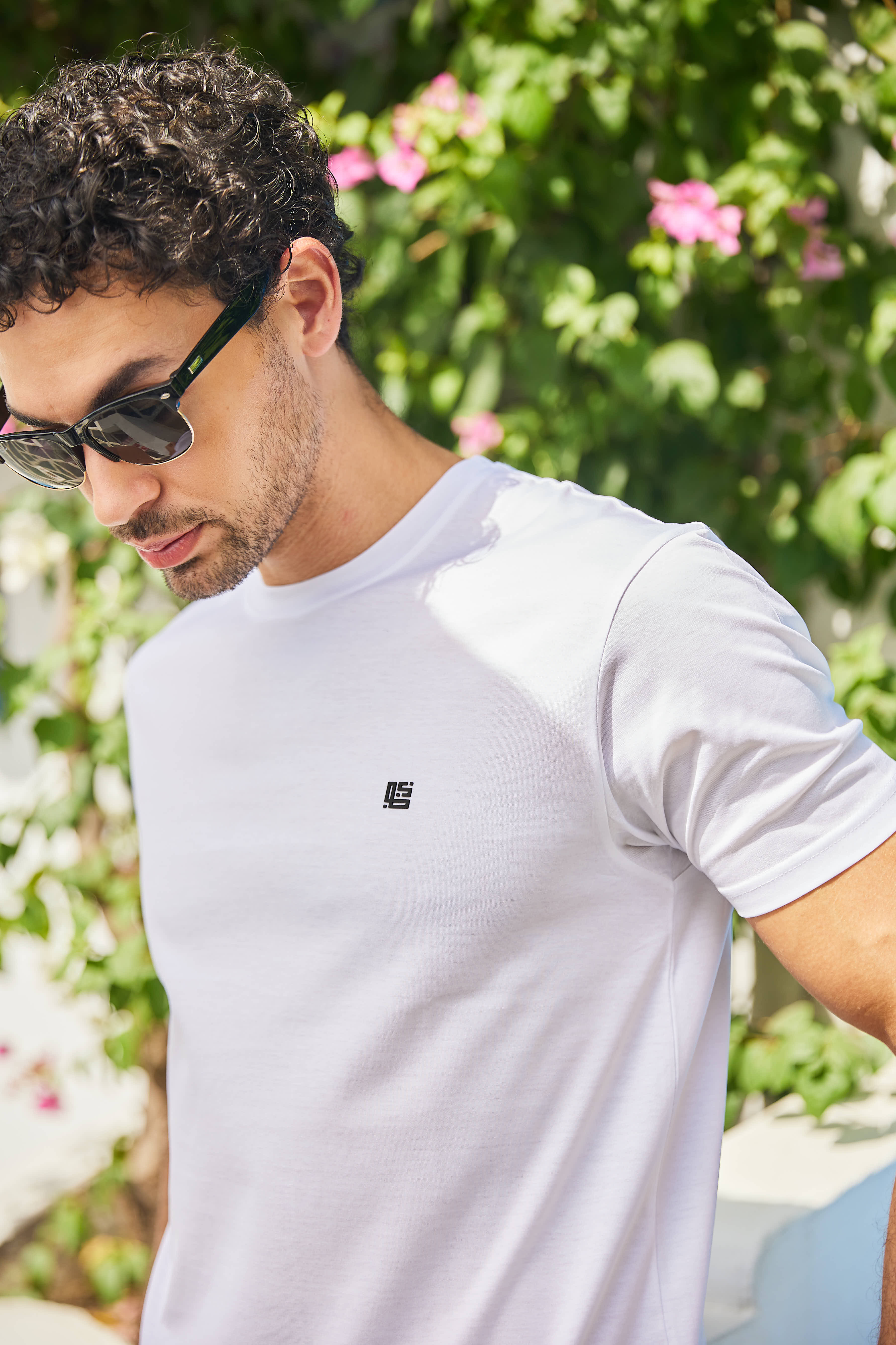 White Textured Solid Crew Neck T Shirt