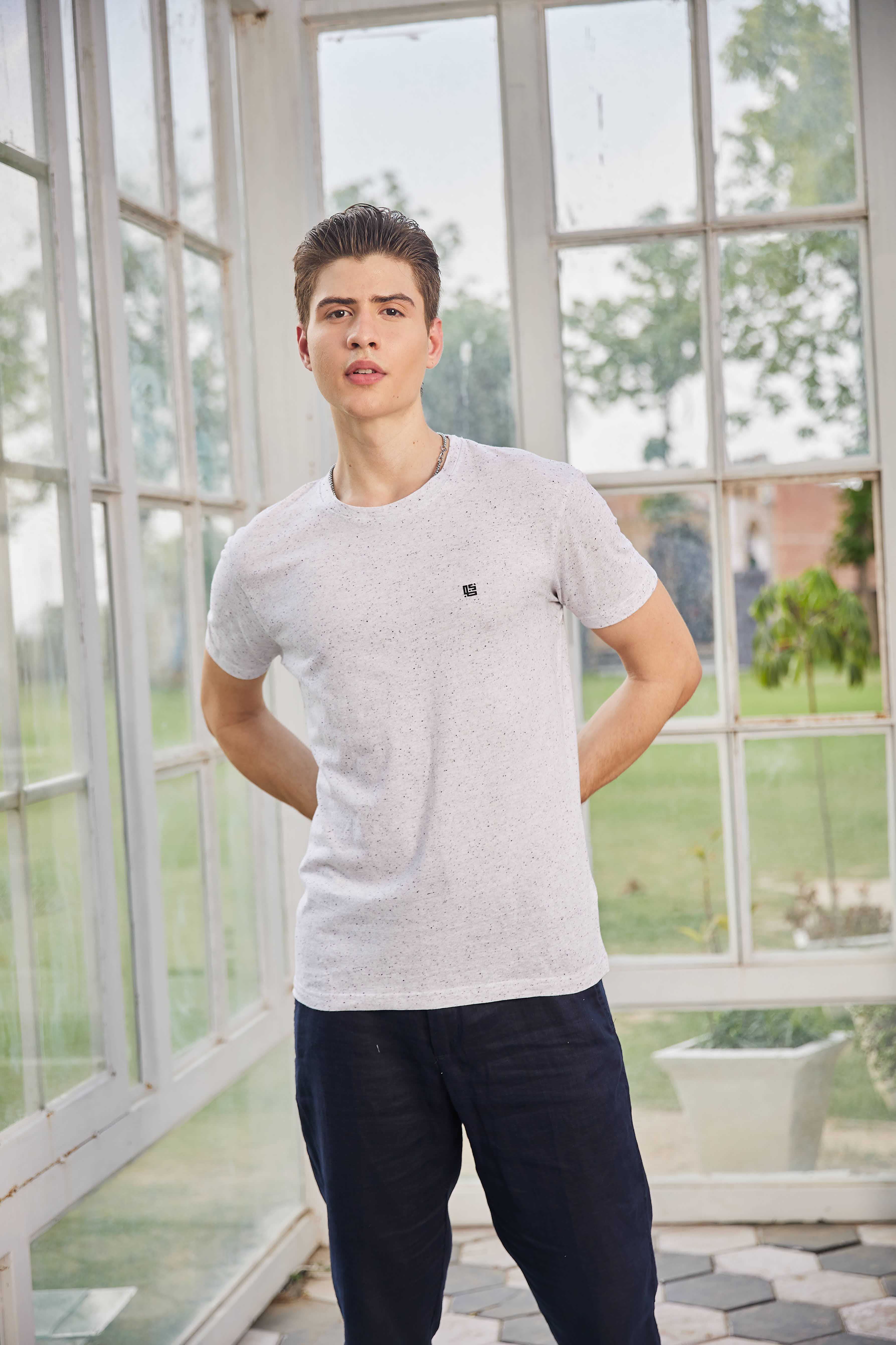 Off White Textured Solid Crew Neck T Shirt